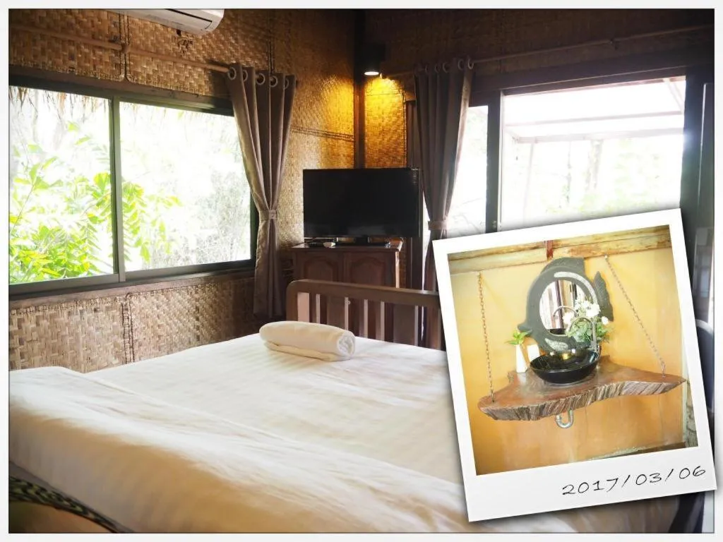 Bed in Tayan Resort Kanchanaburi