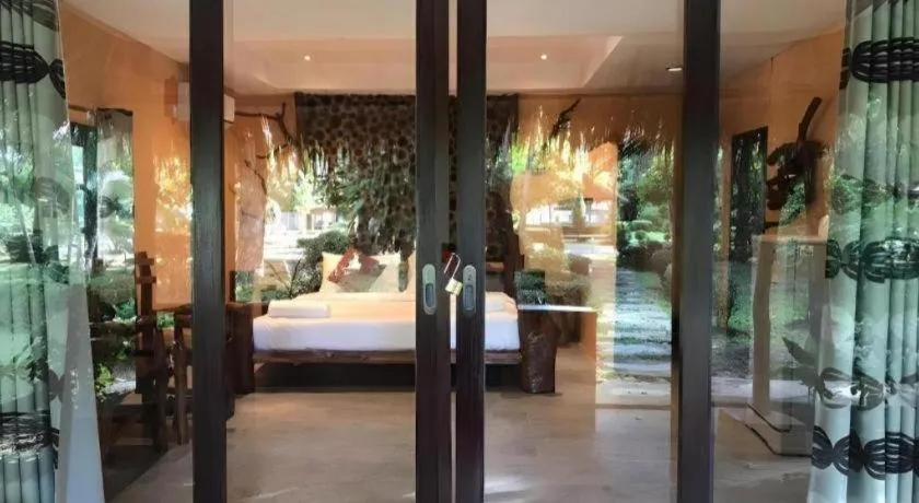 Bed in Tayan Resort Kanchanaburi