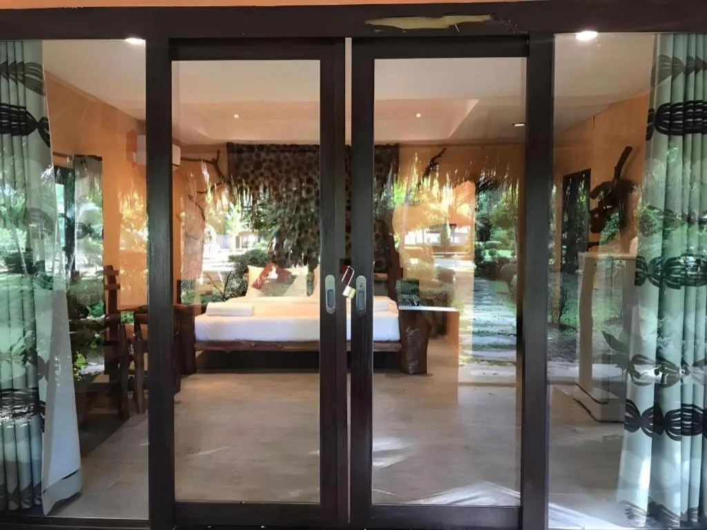 Bed in Tayan Resort Kanchanaburi