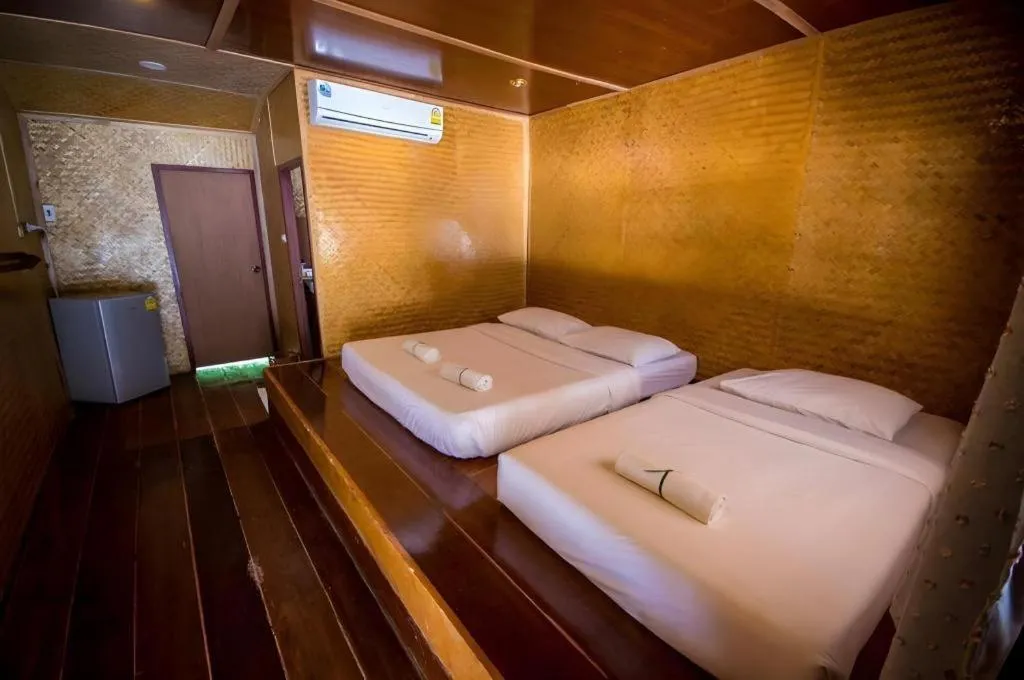 Bed in Tayan Resort Kanchanaburi