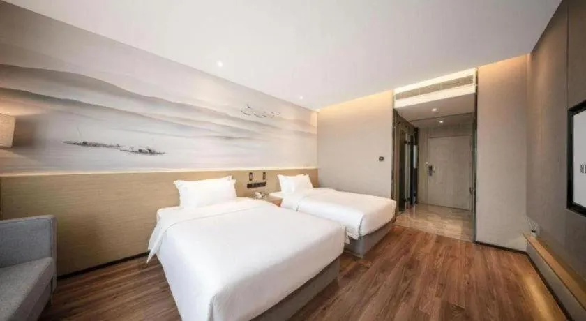 Bed in Rezen Hotel Huaxia Xiamen