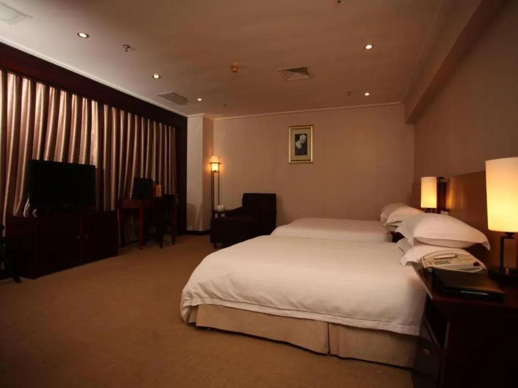 Bed in Rezen Hotel Huaxia Xiamen