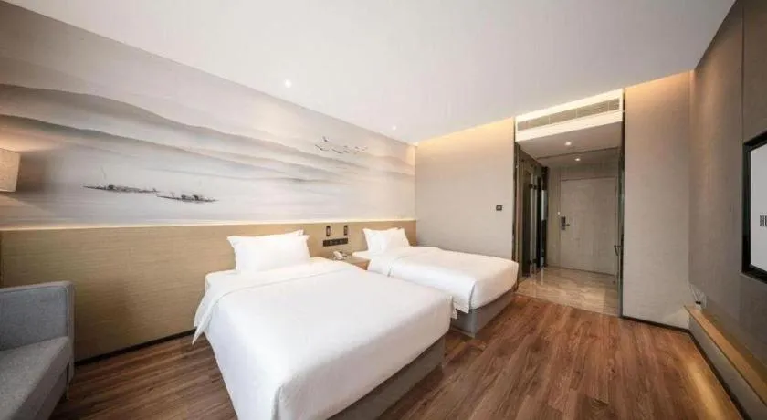 Bed in Rezen Hotel Huaxia Xiamen