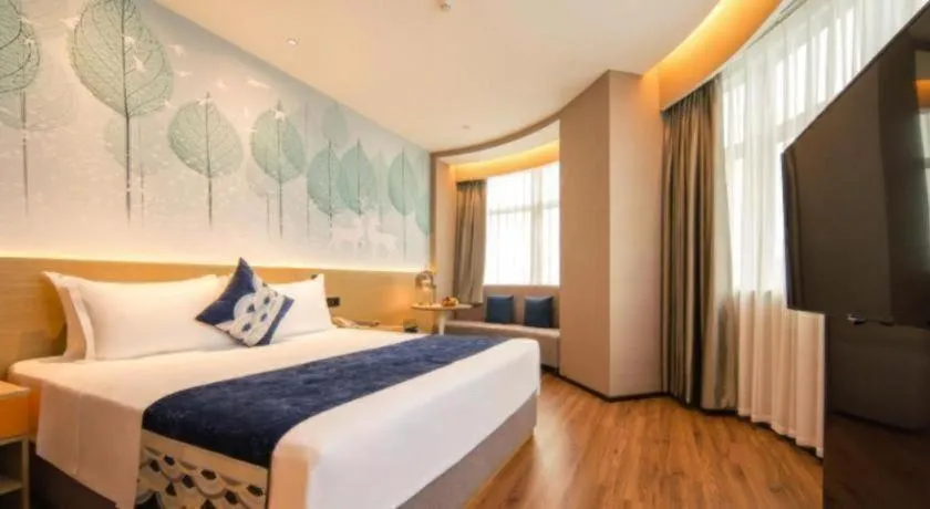 Bed in Rezen Hotel Huaxia Xiamen