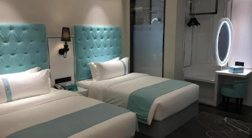 Bed in Xana Hotelle XiAn Gig Wild Goose Pagoda Branch