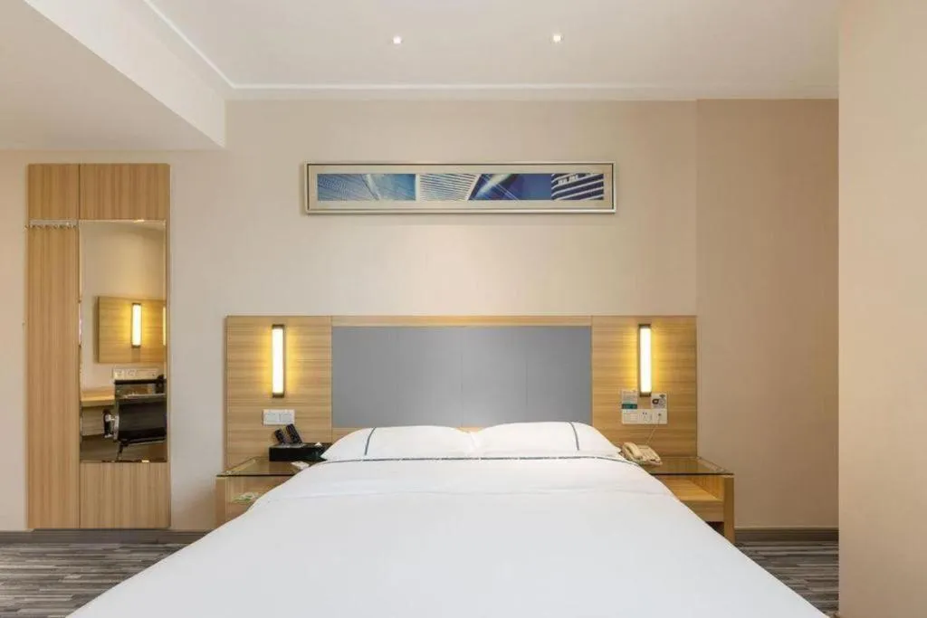 Bed in City Comfort Inn Hechi Nandan