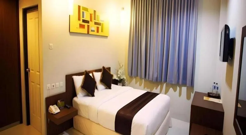 Bed in Mataram Square Hotel