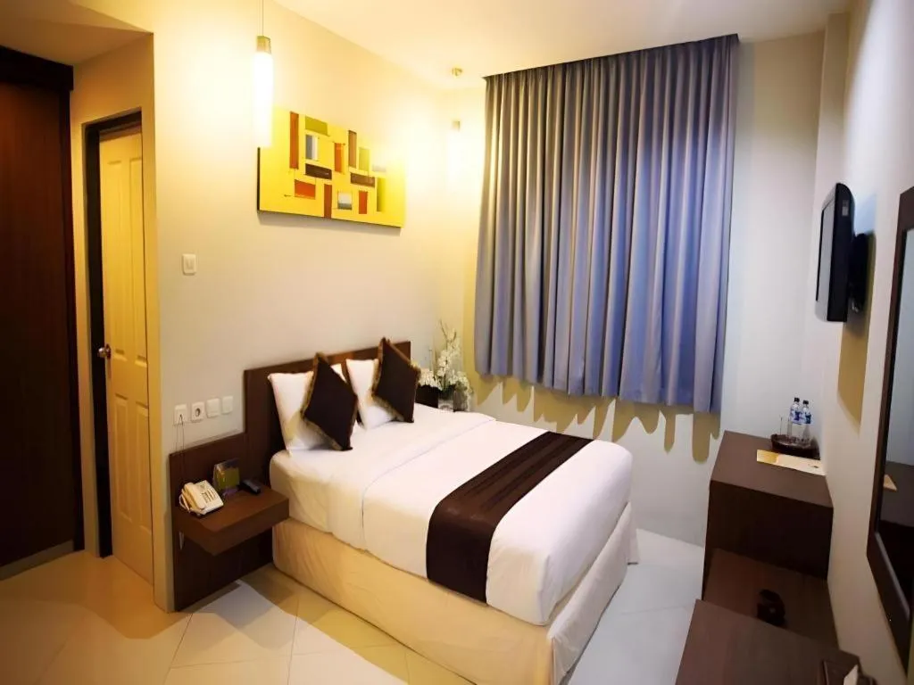 Bed in Mataram Square Hotel