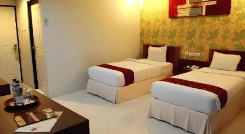 Bed in Mataram Square Hotel