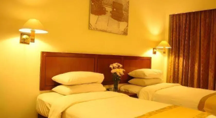 Bed in Bumi Wiyata Hotel