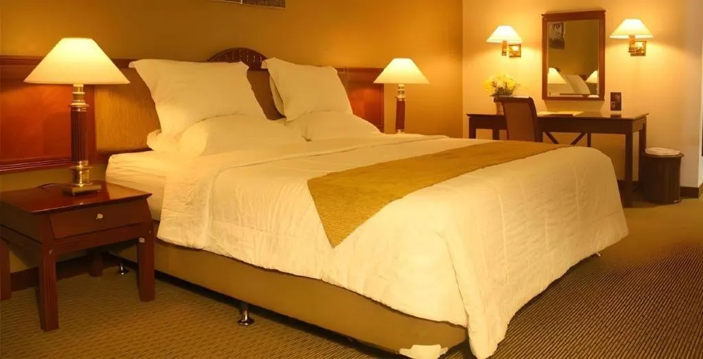 Bed in Bumi Wiyata Hotel