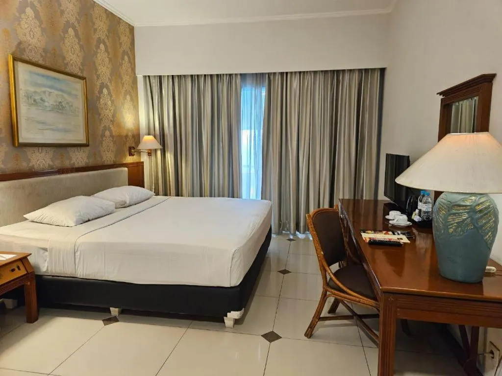 Bed in Bumi Wiyata Hotel