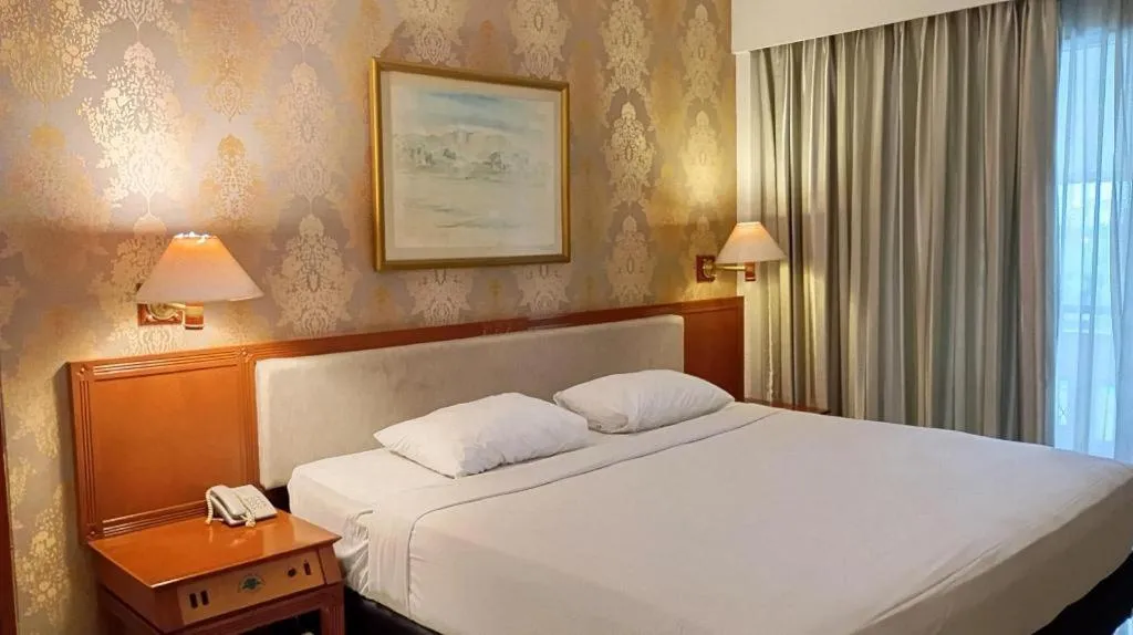 Bed in Bumi Wiyata Hotel