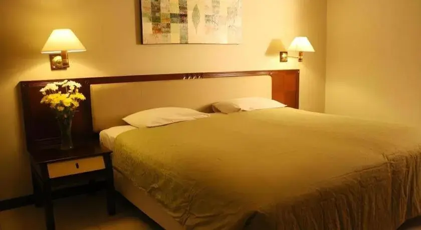 Bed in Bumi Wiyata Hotel Bed in Bumi Wiyata Hotel