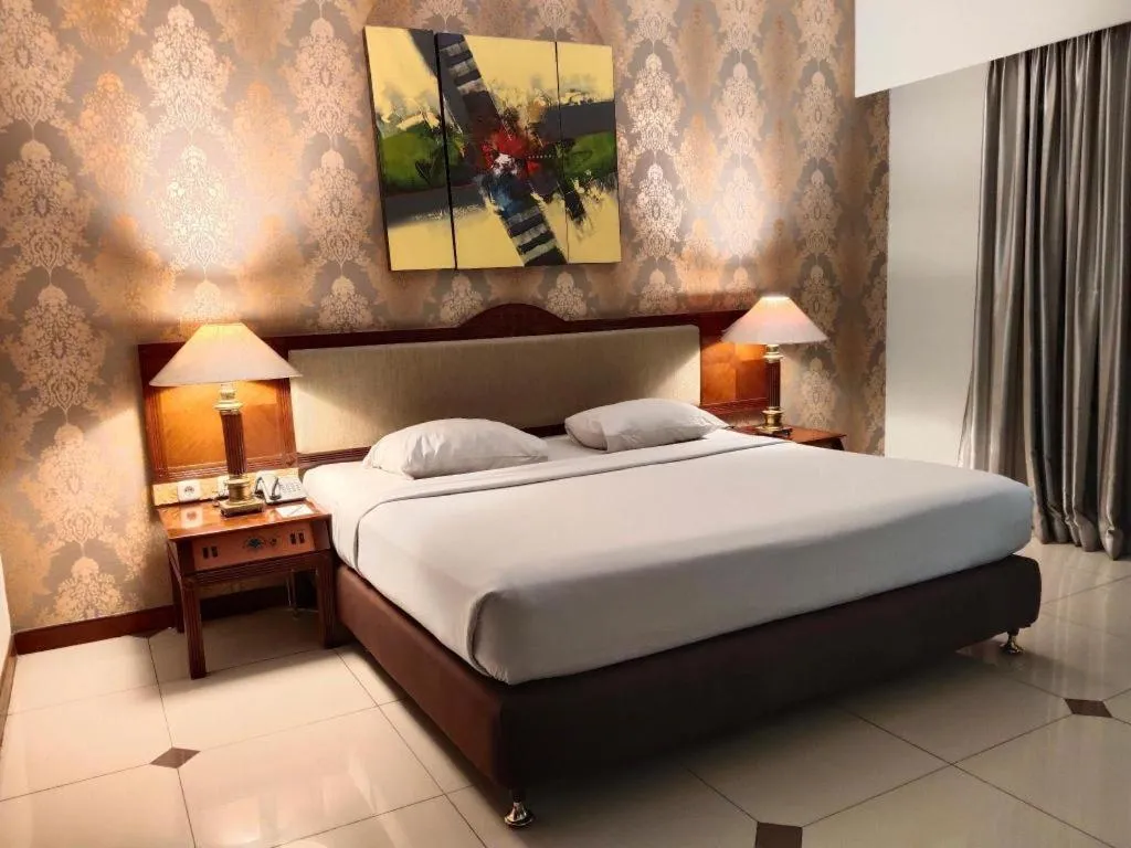 Bed in Bumi Wiyata Hotel