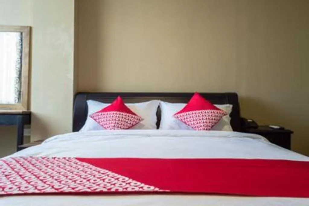 Bed in Nipah Island Resort