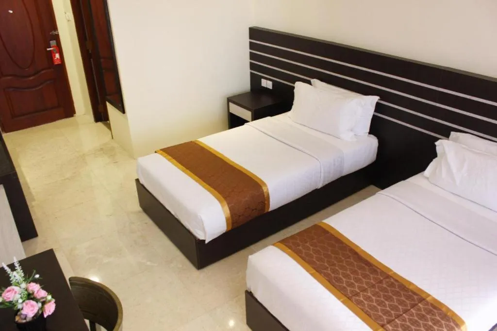 Bed in Nipah Island Resort