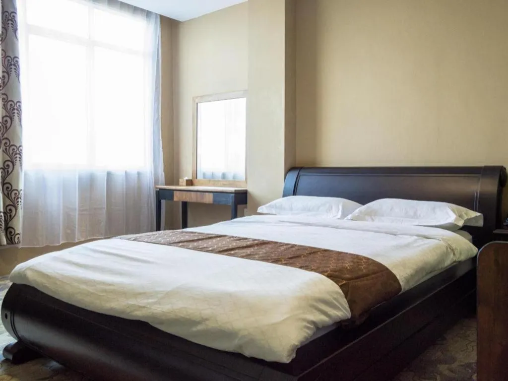 Bed in Nipah Island Resort