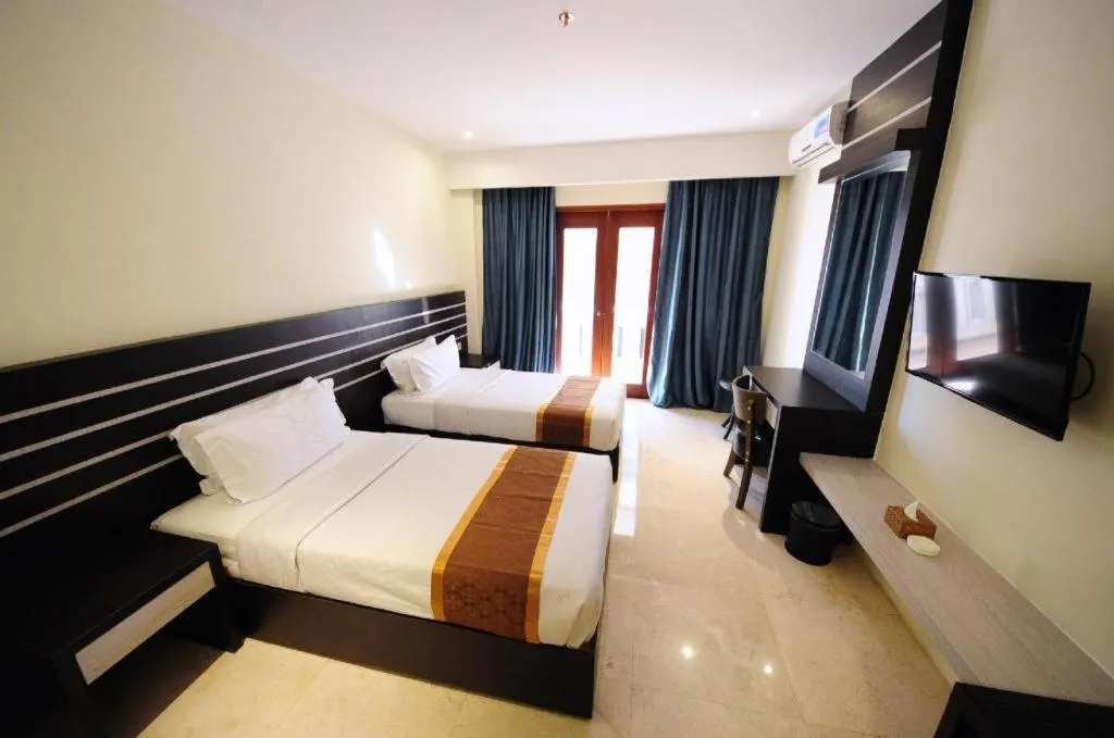 Bed in Nipah Island Resort