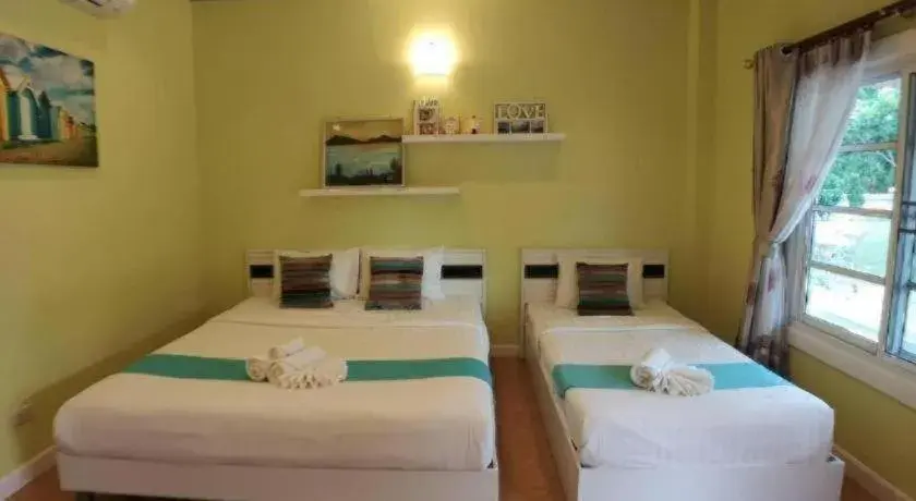 Bed in Chiangkhan Gallery Resort Bed in Chiangkhan Gallery Resort