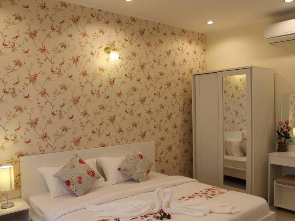 Bed in Chiangkhan Gallery Resort