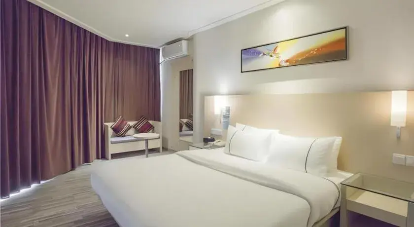 Bed in City Comfort Inn Dongxing National Trade Port Bed in City Comfort Inn Dongxing National Trade Port