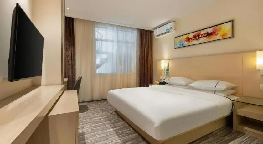 Bed in City Comfort Inn Dongxing National Trade Port Bed in City Comfort Inn Dongxing National Trade Port