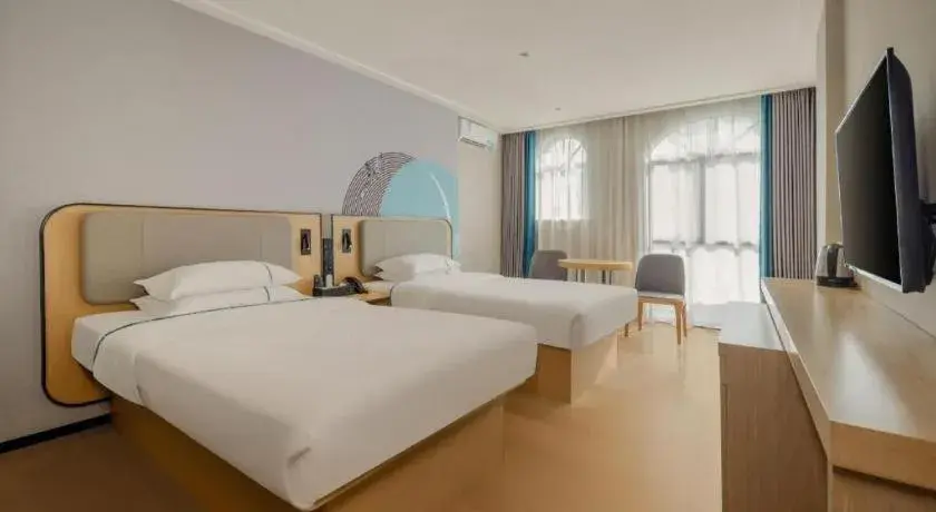 Bed in City Comfort Inn Dongxing National Trade Port Bed in City Comfort Inn Dongxing National Trade Port