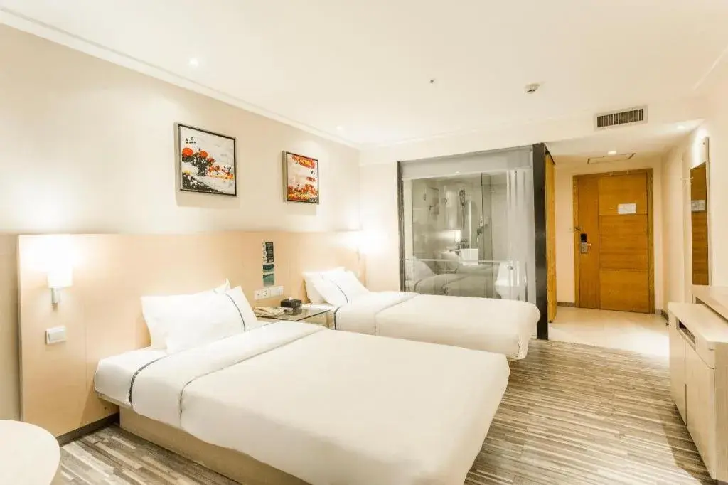 Bed in City Comfort Inn Dongxing National Trade Port Bed in City Comfort Inn Dongxing National Trade Port