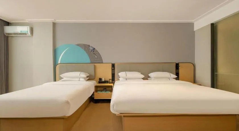 Bed in City Comfort Inn Dongxing National Trade Port
