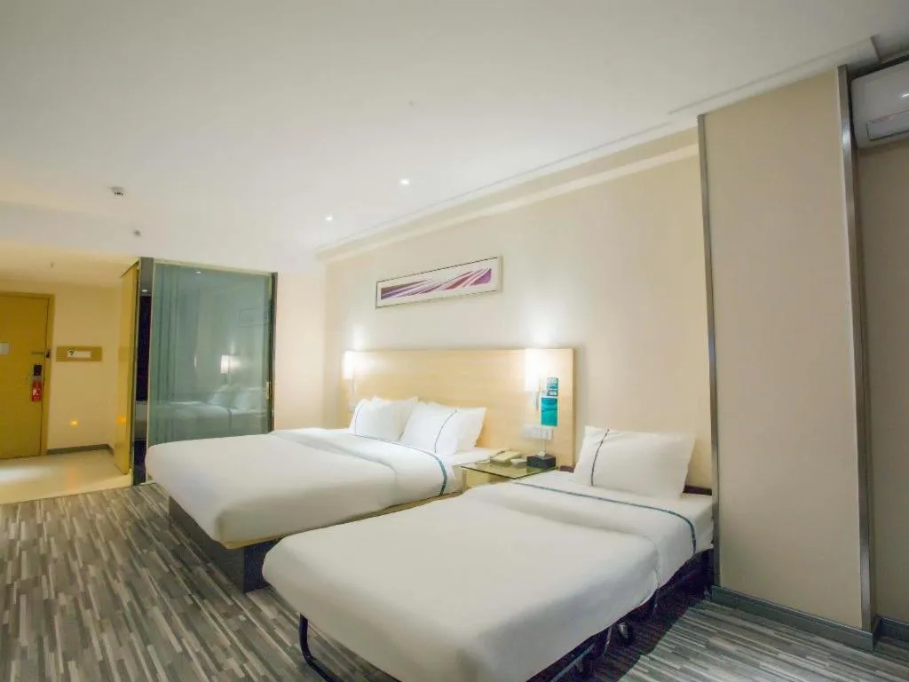 Bed in City Comfort Inn Dongxing National Trade Port