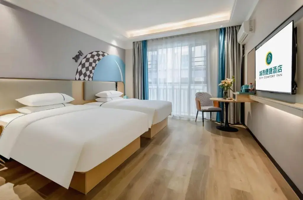 Bed in City Comfort Inn Dongxing National Trade Port Bed in City Comfort Inn Dongxing National Trade Port
