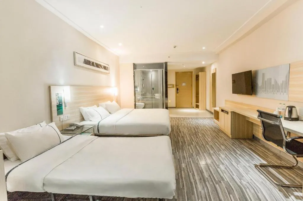 Bed in City Comfort Inn Dongxing National Trade Port