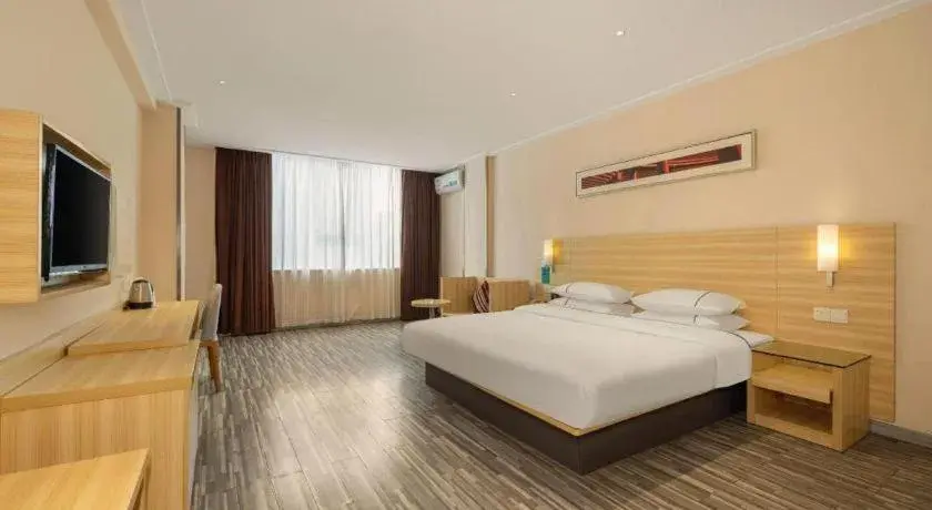 Bed in City Comfort Inn Dongxing National Trade Port Bed in City Comfort Inn Dongxing National Trade Port