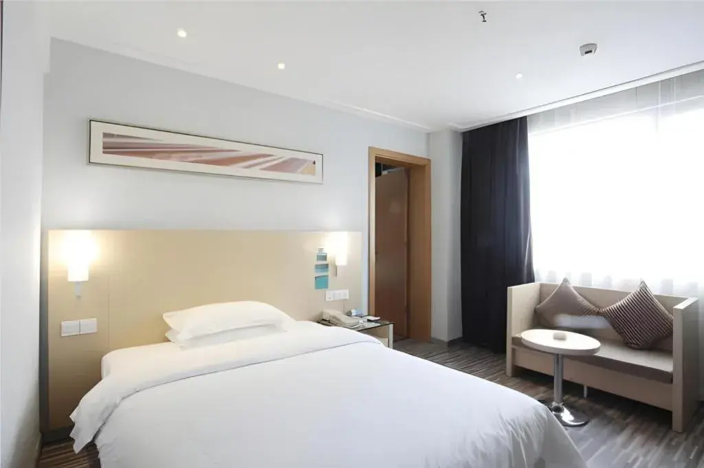 Bed in City Comfort Inn Dongxing National Trade Port Bed in City Comfort Inn Dongxing National Trade Port