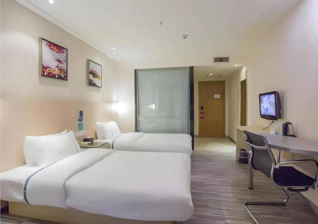 Bed in City Comfort Inn Dongxing National Trade Port Bed in City Comfort Inn Dongxing National Trade Port
