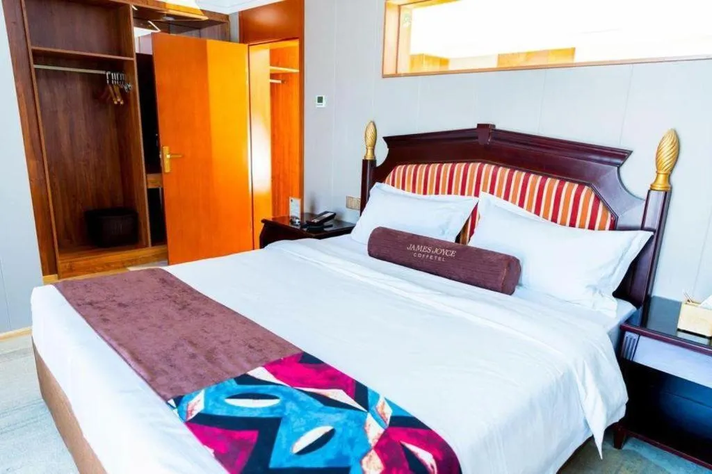 Bed in James Joyce Coffetel Qinhuangdao Taiyangcheng Wenhua Road