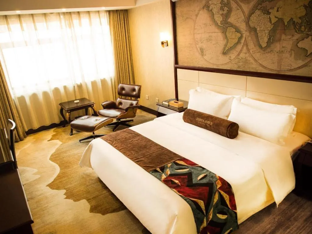 Bed in James Joyce Coffetel Qinhuangdao Taiyangcheng Wenhua Road