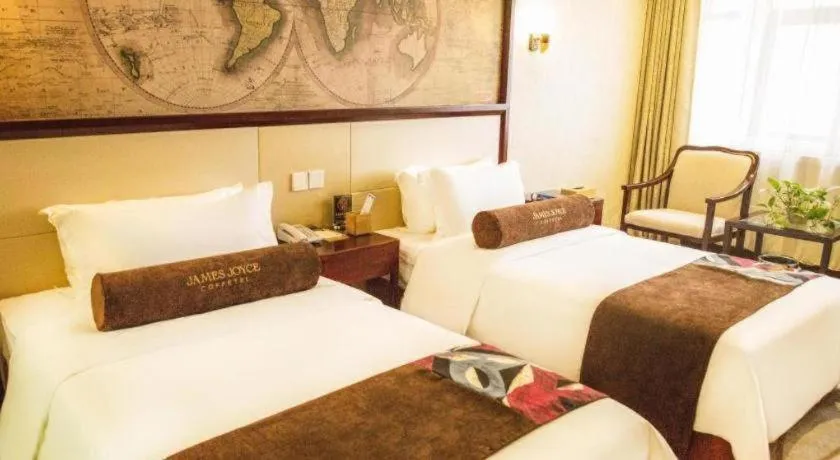 Bed in James Joyce Coffetel Qinhuangdao Taiyangcheng Wenhua Road