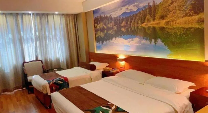 Bed in James Joyce Coffetel Qinhuangdao Taiyangcheng Wenhua Road