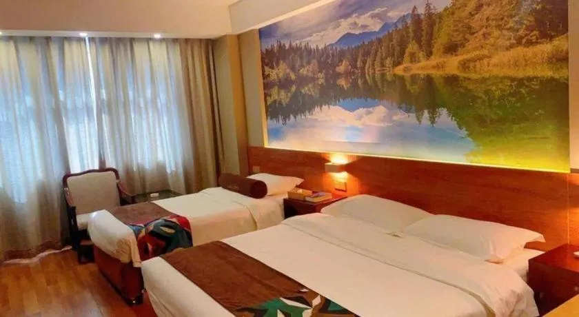 Bed in James Joyce Coffetel Qinhuangdao Taiyangcheng Wenhua Road