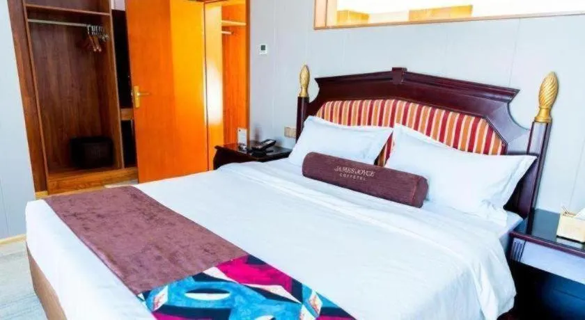 Bed in James Joyce Coffetel Qinhuangdao Taiyangcheng Wenhua Road