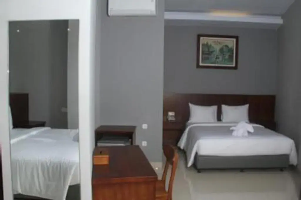 Bed in HOTEL GRAND KUTILANG SYARIAH Bed in HOTEL GRAND KUTILANG SYARIAH