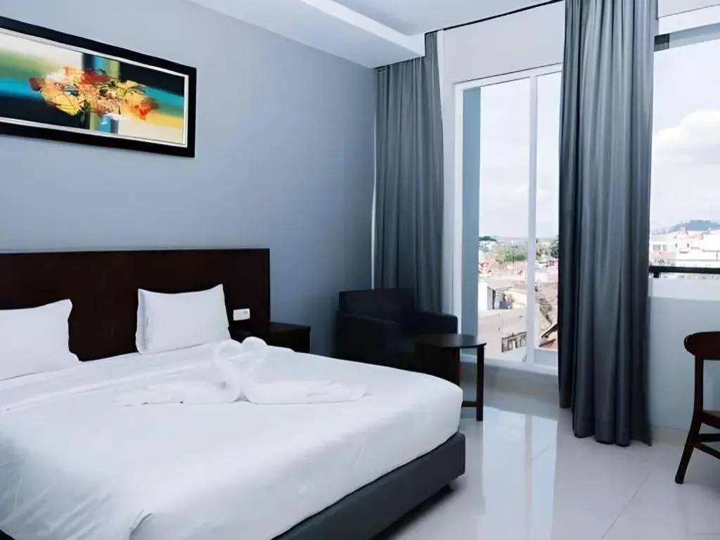 Bed in HOTEL GRAND KUTILANG SYARIAH Bed in HOTEL GRAND KUTILANG SYARIAH