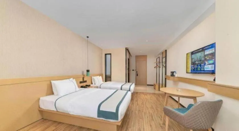 Bed in City Comfort Inn Yulin Wenhua Square Wanda Plaza