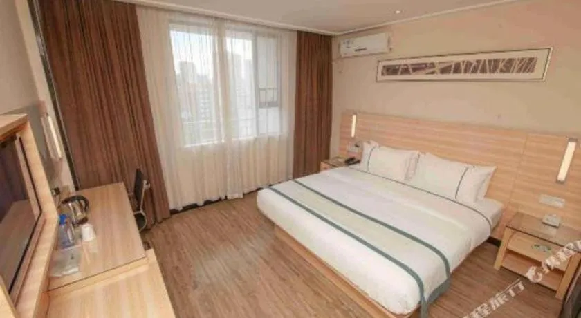 Bed in City Comfort Inn Yulin Wenhua Square Wanda Plaza
