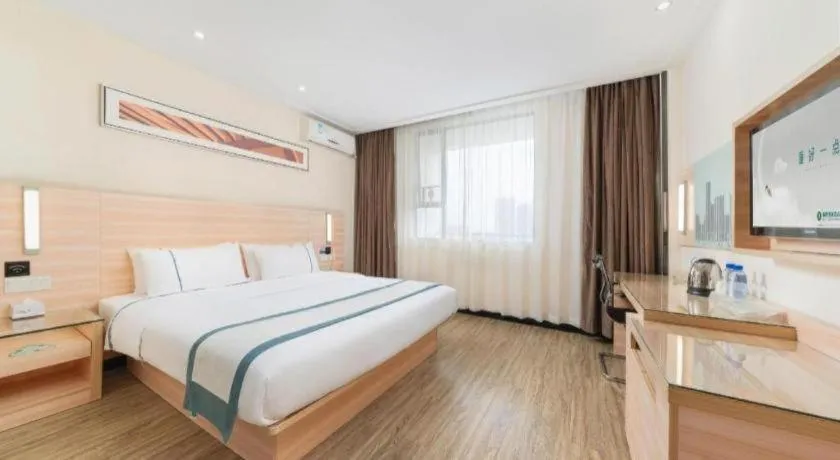 Bed in City Comfort Inn Yulin Wenhua Square Wanda Plaza