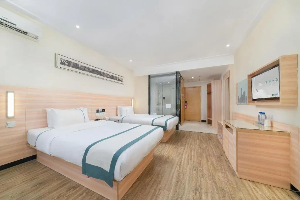 Bed in City Comfort Inn Yulin Wenhua Square Wanda Plaza