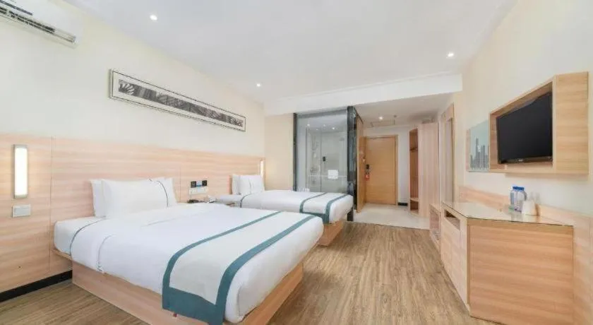 Bed in City Comfort Inn Yulin Wenhua Square Wanda Plaza