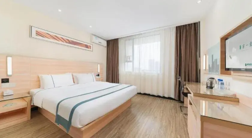 Bed in City Comfort Inn Yulin Wenhua Square Wanda Plaza Bed in City Comfort Inn Yulin Wenhua Square Wanda Plaza